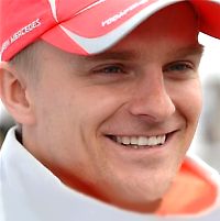 Kovalainen Gets Lucky Victory At Hungary