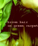Brown Hair on Green Carpet